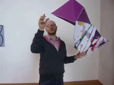 Man with giant papercraft thought designed by year 8 & 9 students at Weatherhead High School